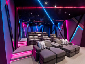 Pink and Blue LED lighting in a home theater. Ideas for your home theater.