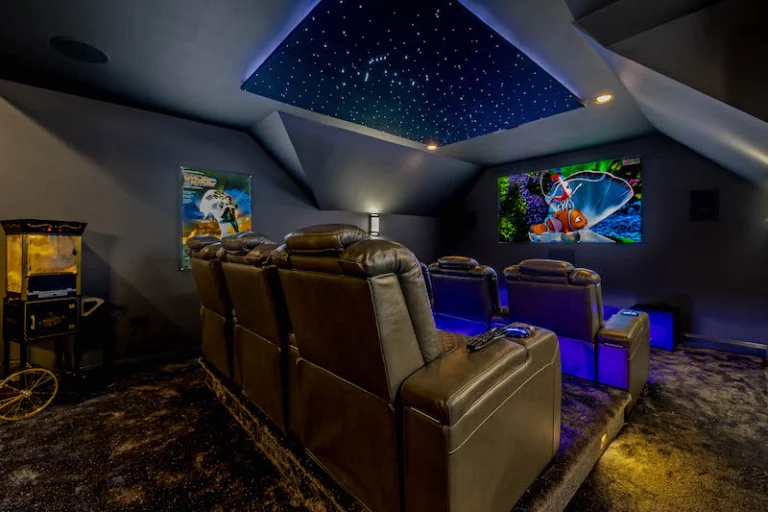 home theater with star ceilings and movie cinema style seats
